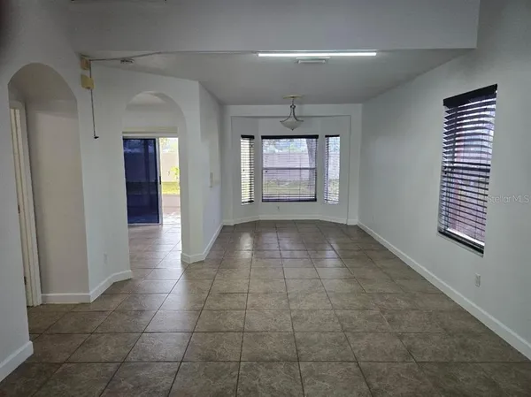 a view of an empty room and window