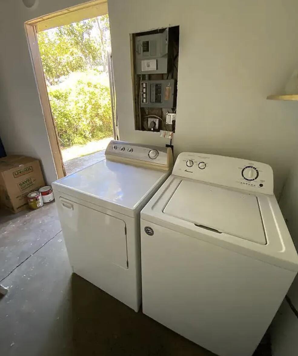 1026 Upland Road, Unit MAIN HOUSE West Palm Beach, FL 33401 - Photo 11 of 11 a utility room with dryer and washer