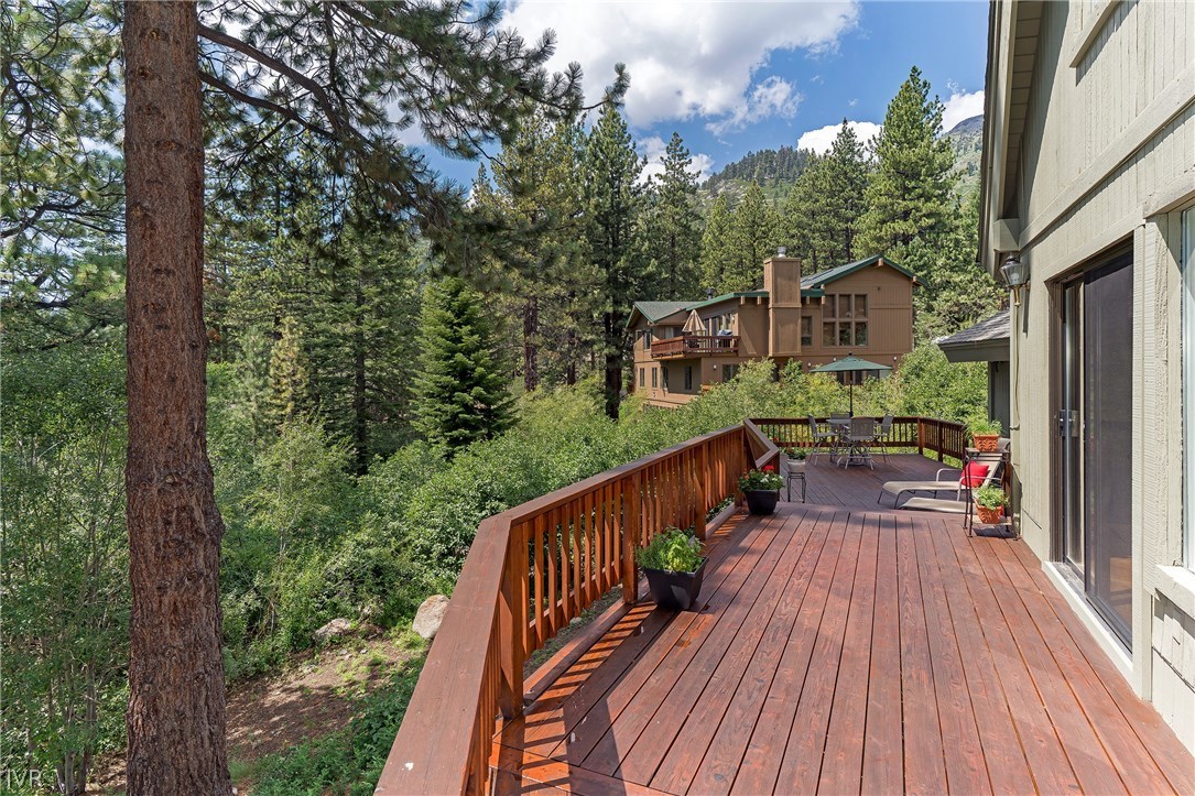 999 Apollo Way Incline Village, NV 89451 - Photo 26 of 33 a balcony with wooden floor and outdoor seating