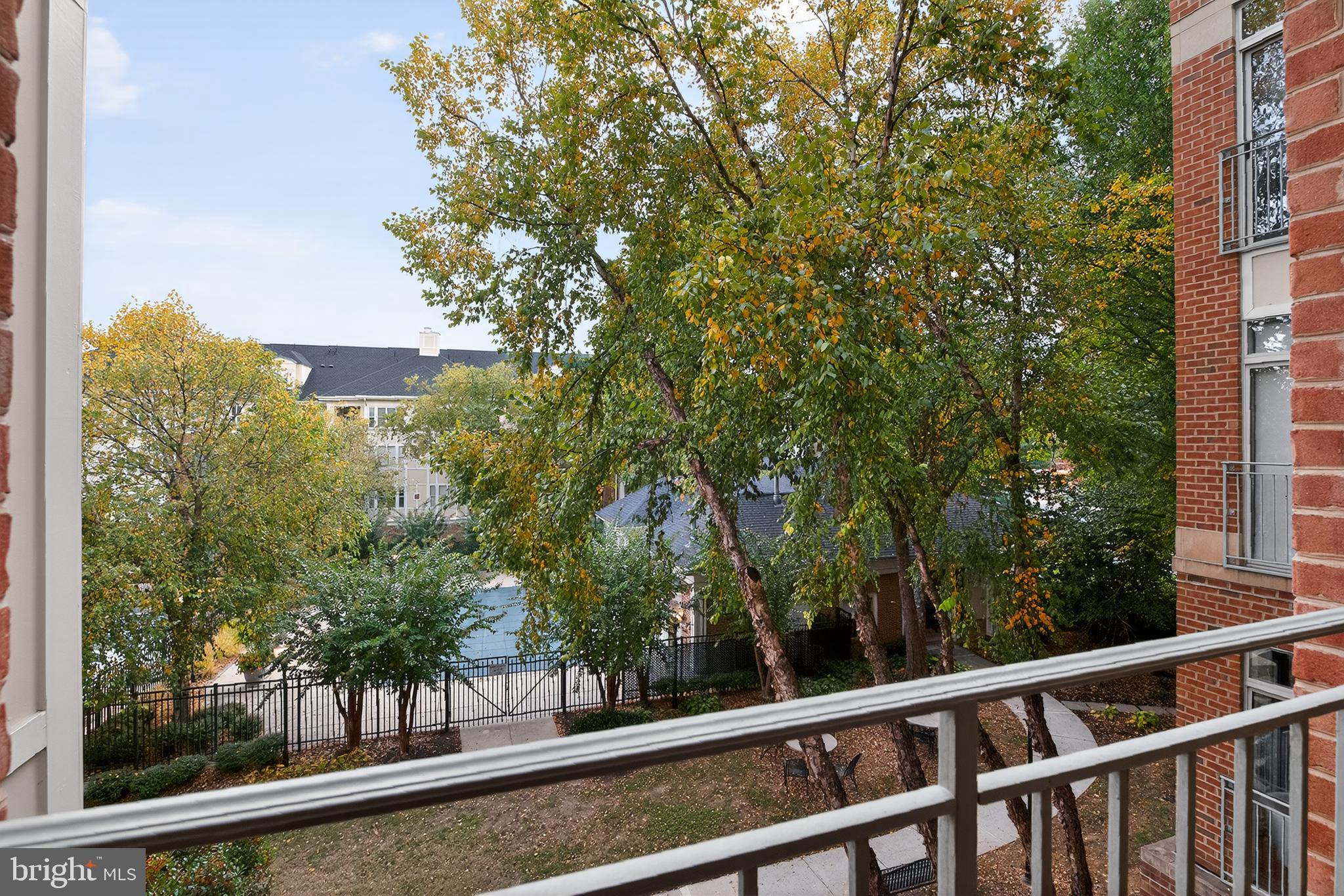11775 Stratford House Place, Unit 206 Reston, VA 20190 - Photo 25 of 39 a view of a trees from a window