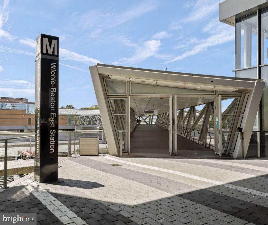 11775 Stratford House Place, Unit 206 Reston, VA 20190 - Photo 39 of 39 a front view of a building with a glass door