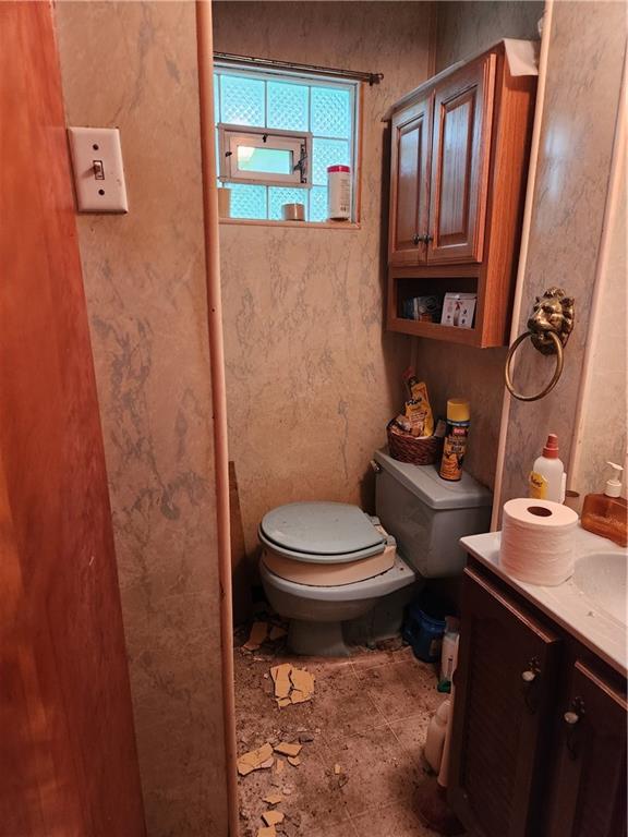 238 East 19th Avenue Homestead, PA 15120 - Photo 4 of 4 a bathroom with a toilet a sink and a shower