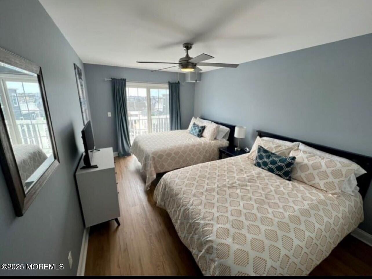 15 Sumner Avenue, Unit 11 Seaside Heights, NJ 08751 - Photo 12 of 13 a bedroom with bed and window