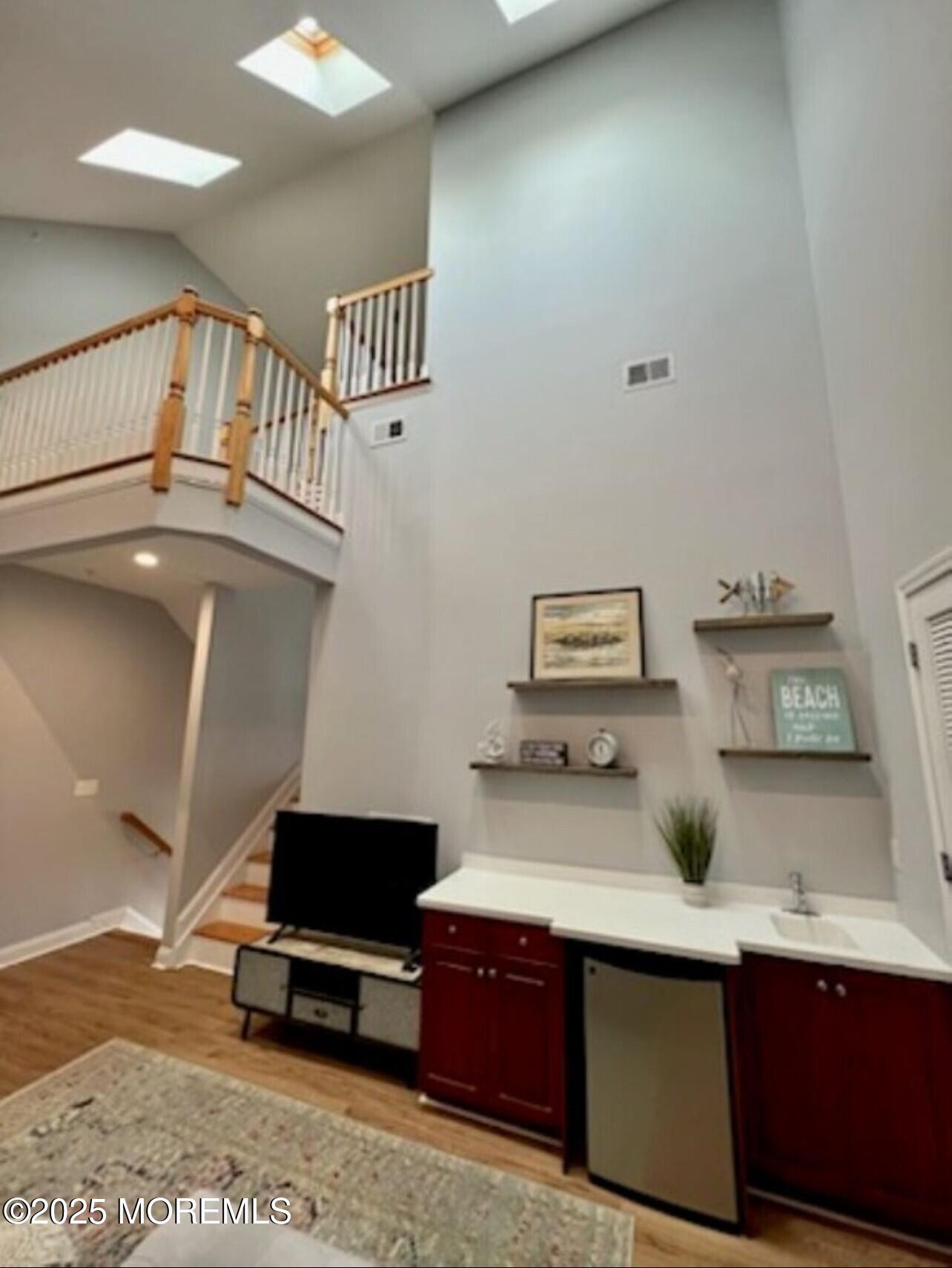 15 Sumner Avenue, Unit 11 Seaside Heights, NJ 08751 - Photo 8 of 13 a view of workspace with a window and couch