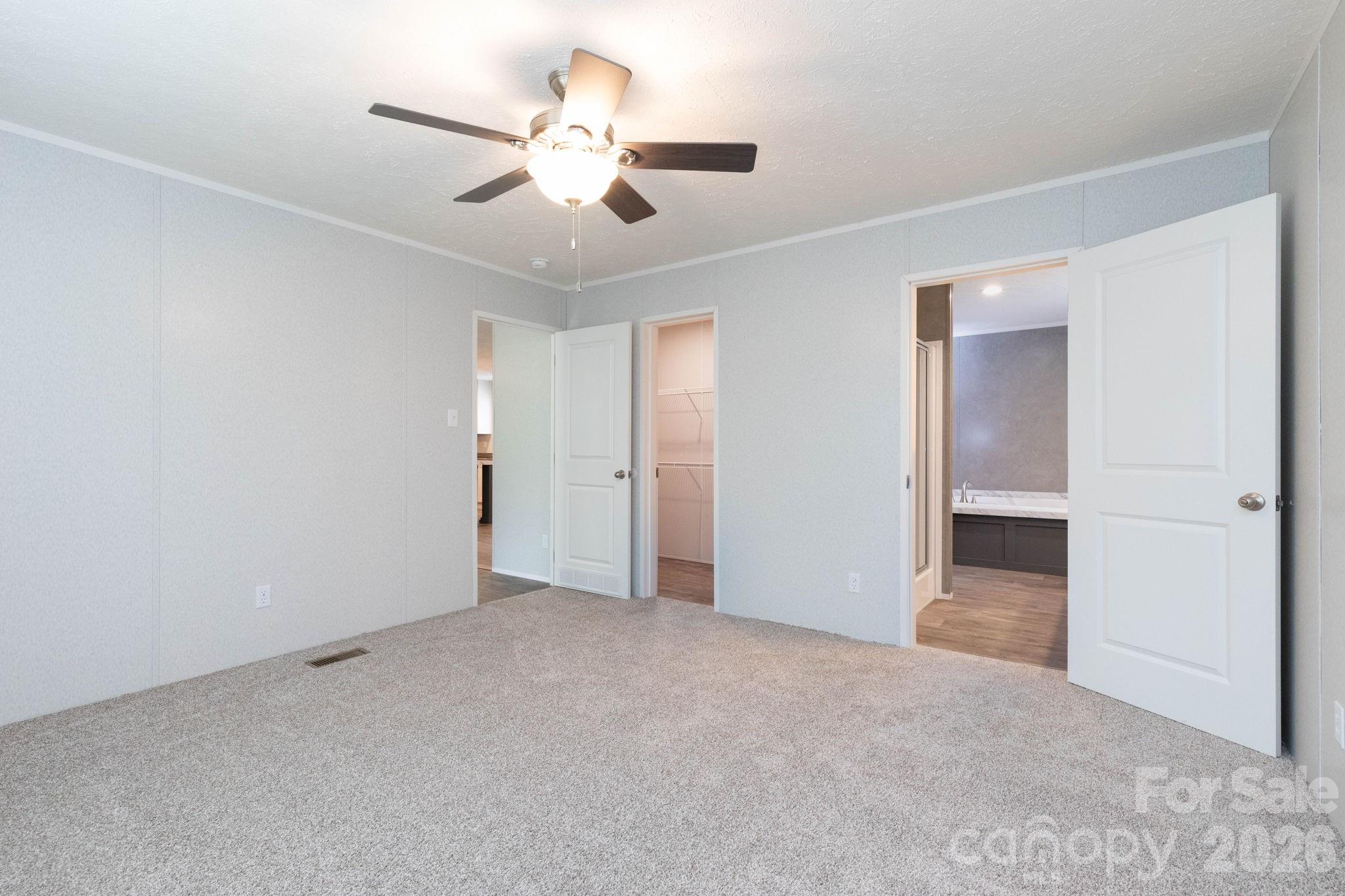 Tbd Bell Sprinkle Road Weaverville, NC 28787 - Photo 12 of 24 an empty room with ceiling fan and window
