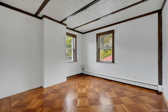a bedroom with bed and window