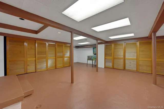 a view of backyard with outdoor seating and green space