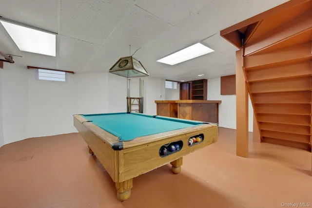 a view of a house with a yard and garage