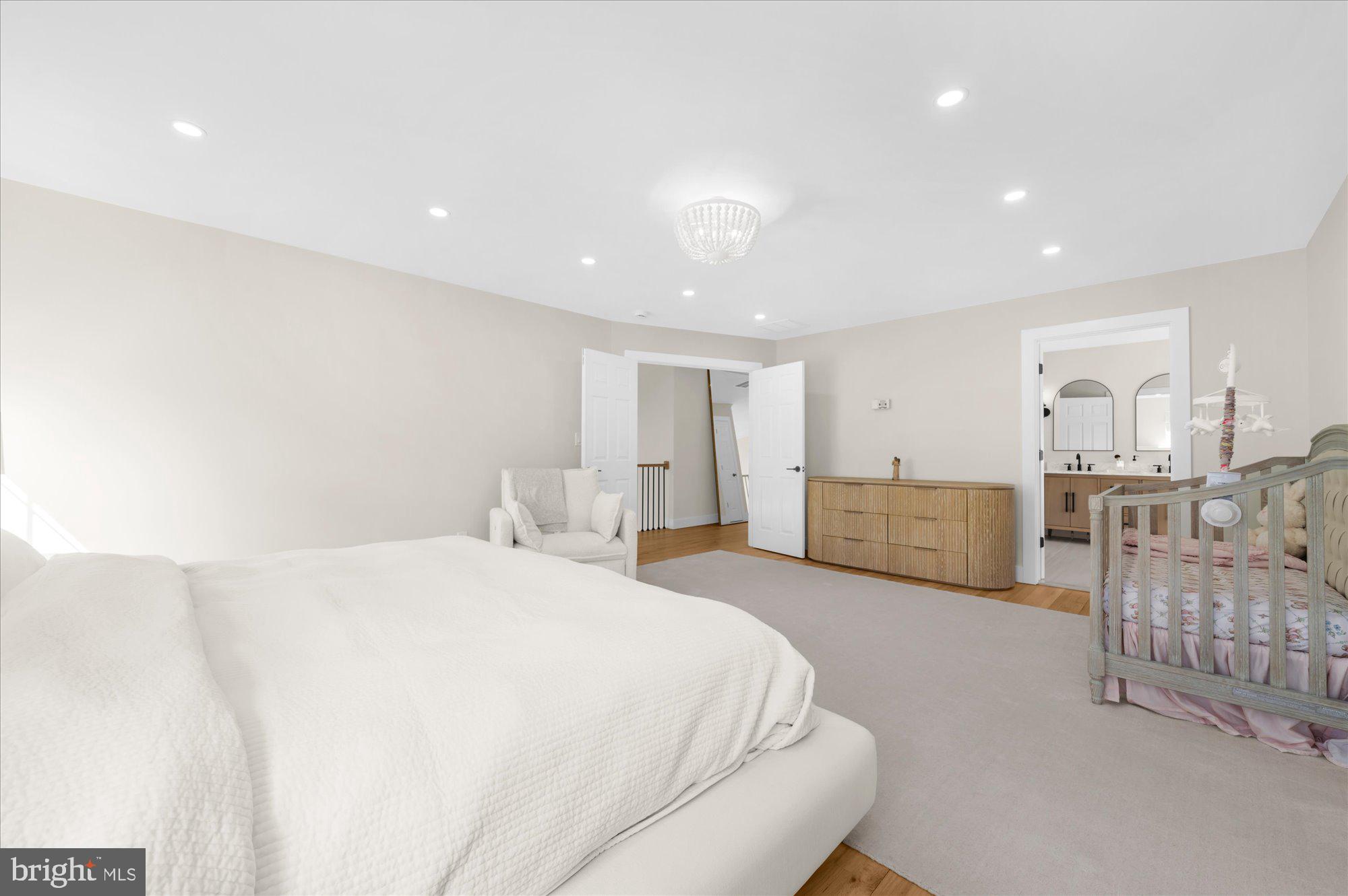 86 Treetops Circle Princeton, NJ 08540 - Photo 21 of 41 a spacious bedroom with a bed and a couch