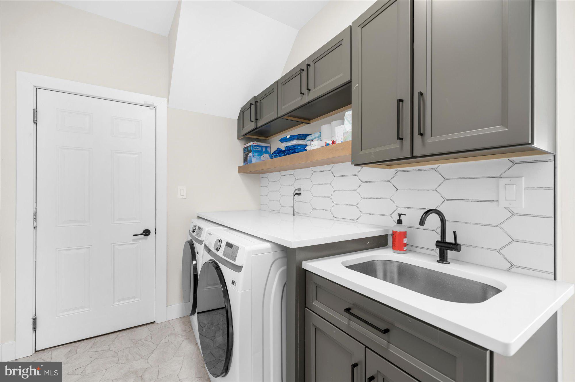 86 Treetops Circle Princeton, NJ 08540 - Photo 29 of 41 a kitchen with a sink cabinets and washing machine