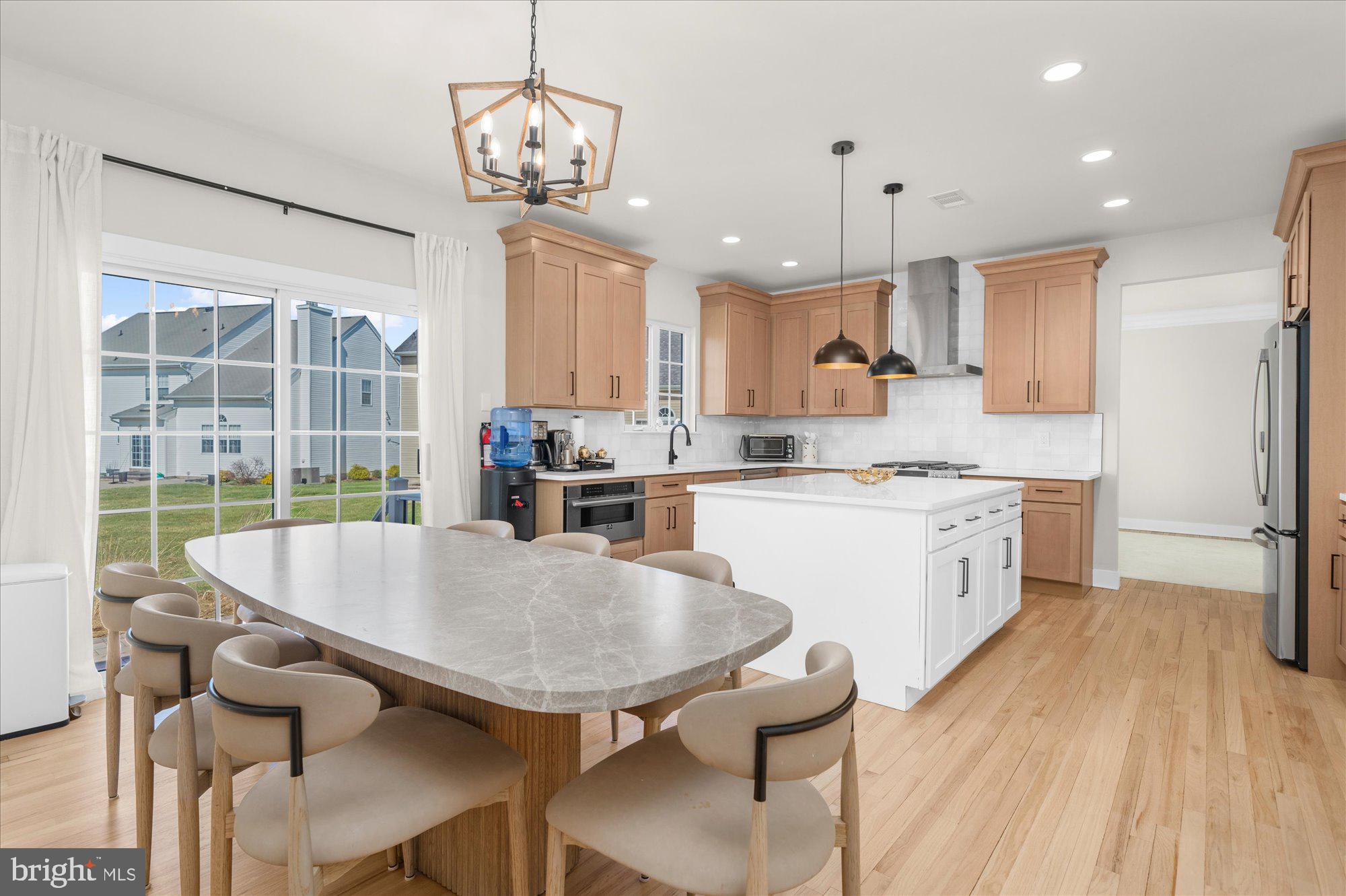 86 Treetops Circle Princeton, NJ 08540 - Photo 3 of 41 a view of kitchen with cabinets table and chairs