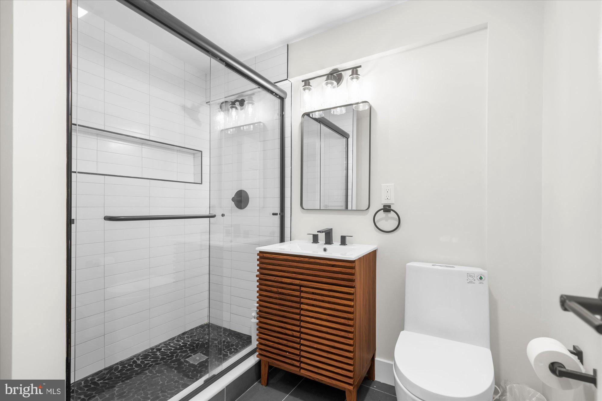 86 Treetops Circle Princeton, NJ 08540 - Photo 32 of 41 a bathroom with a sink toilet and shower