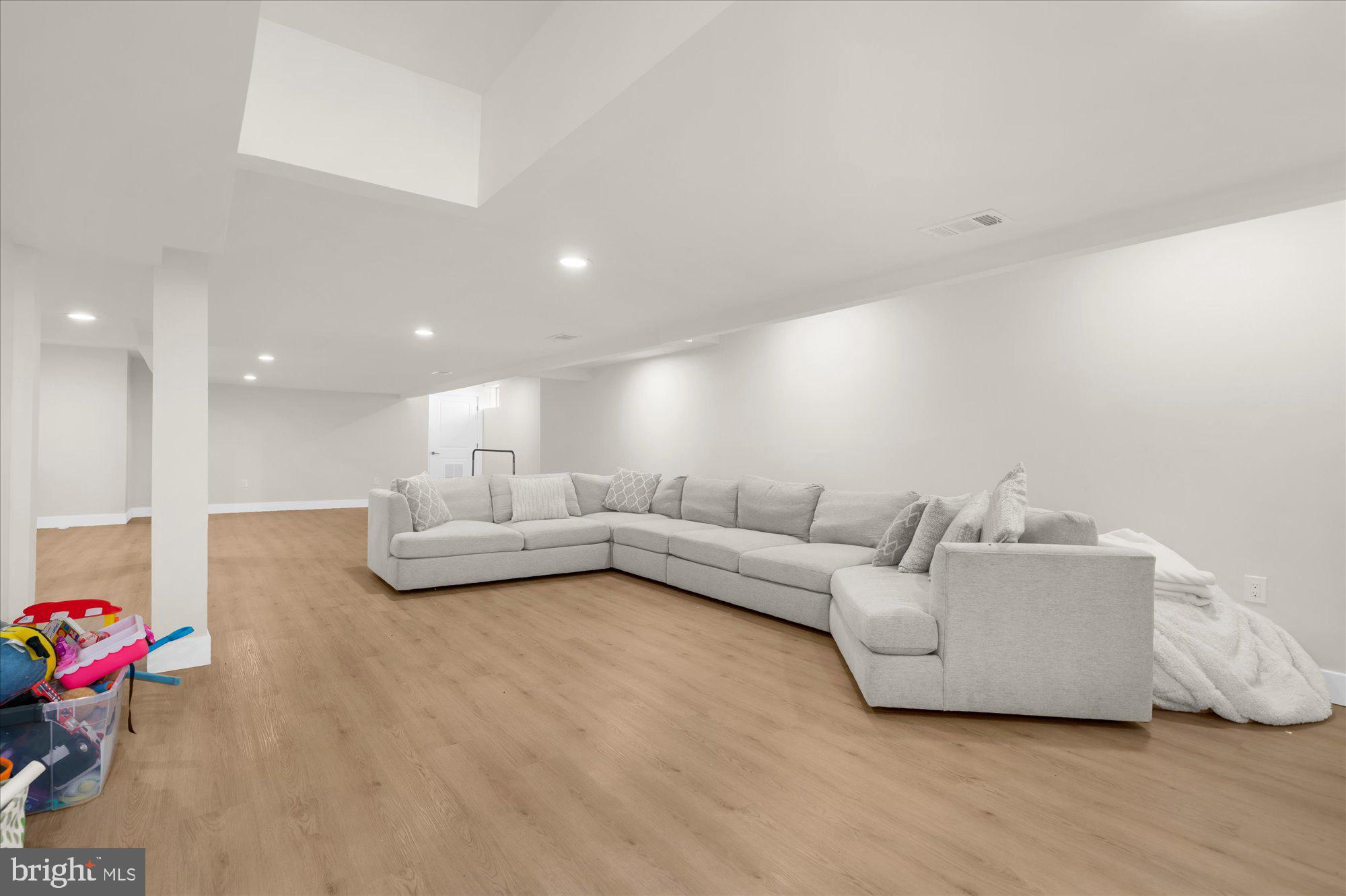 86 Treetops Circle Princeton, NJ 08540 - Photo 35 of 41 a living room with furniture and a wooden floor
