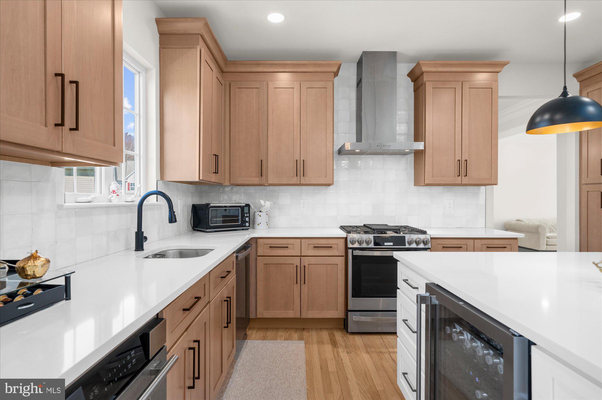 86 Treetops Circle Princeton, NJ 08540 - Photo 8 of 41 a kitchen with stainless steel appliances granite countertop a sink stove and cabinets