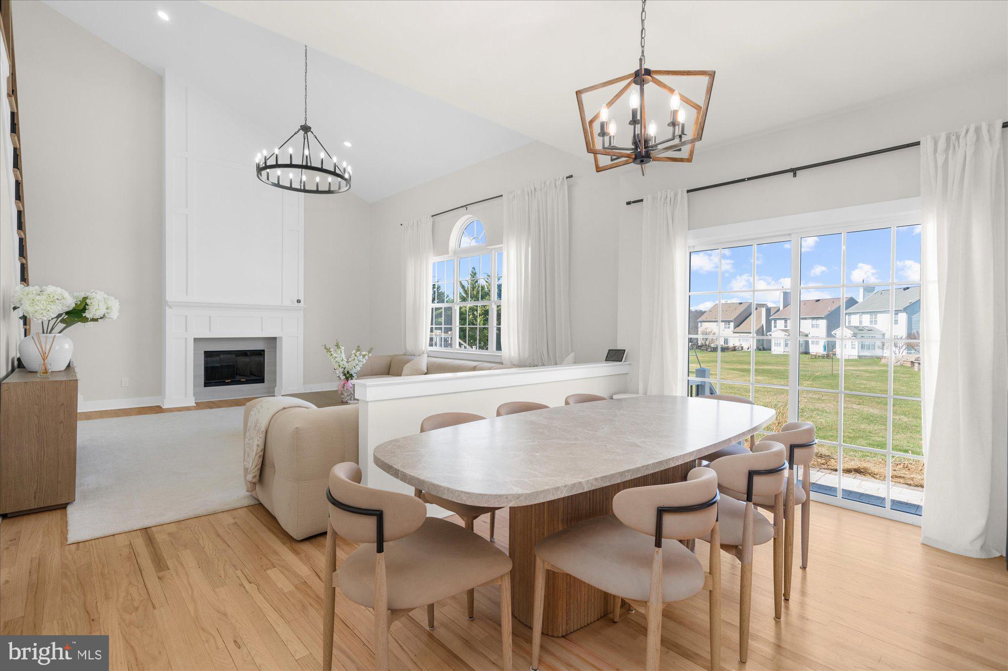 86 Treetops Circle Princeton, NJ 08540 - Photo 9 of 41 a view of a dining room with furniture window and wooden floor