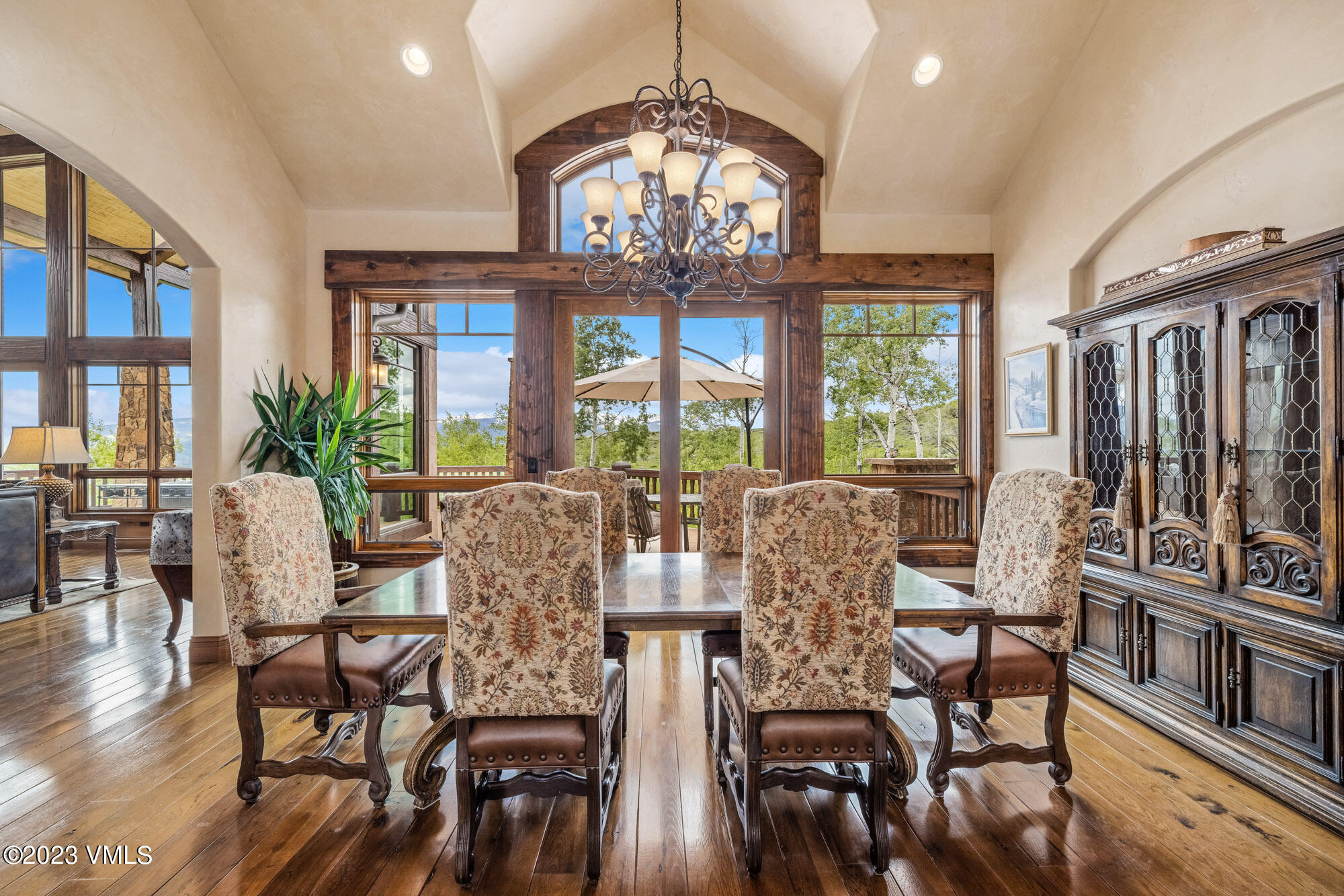 5458 Bellyache Ridge Road Wolcott, CO 81655 - Photo 11 of 63 a view of a dining room with furniture window and wooden floor