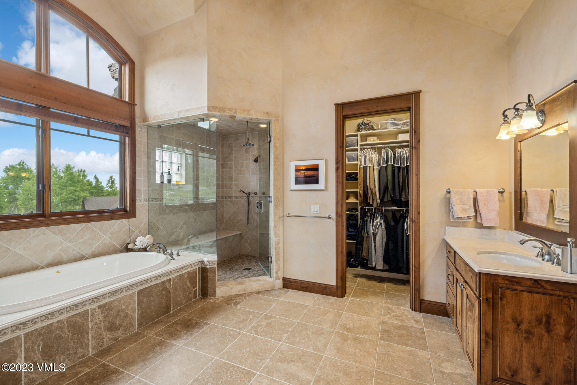 5458 Bellyache Ridge Road Wolcott, CO 81655 - Photo 19 of 63 a spacious bathroom with a tub sink and mirror