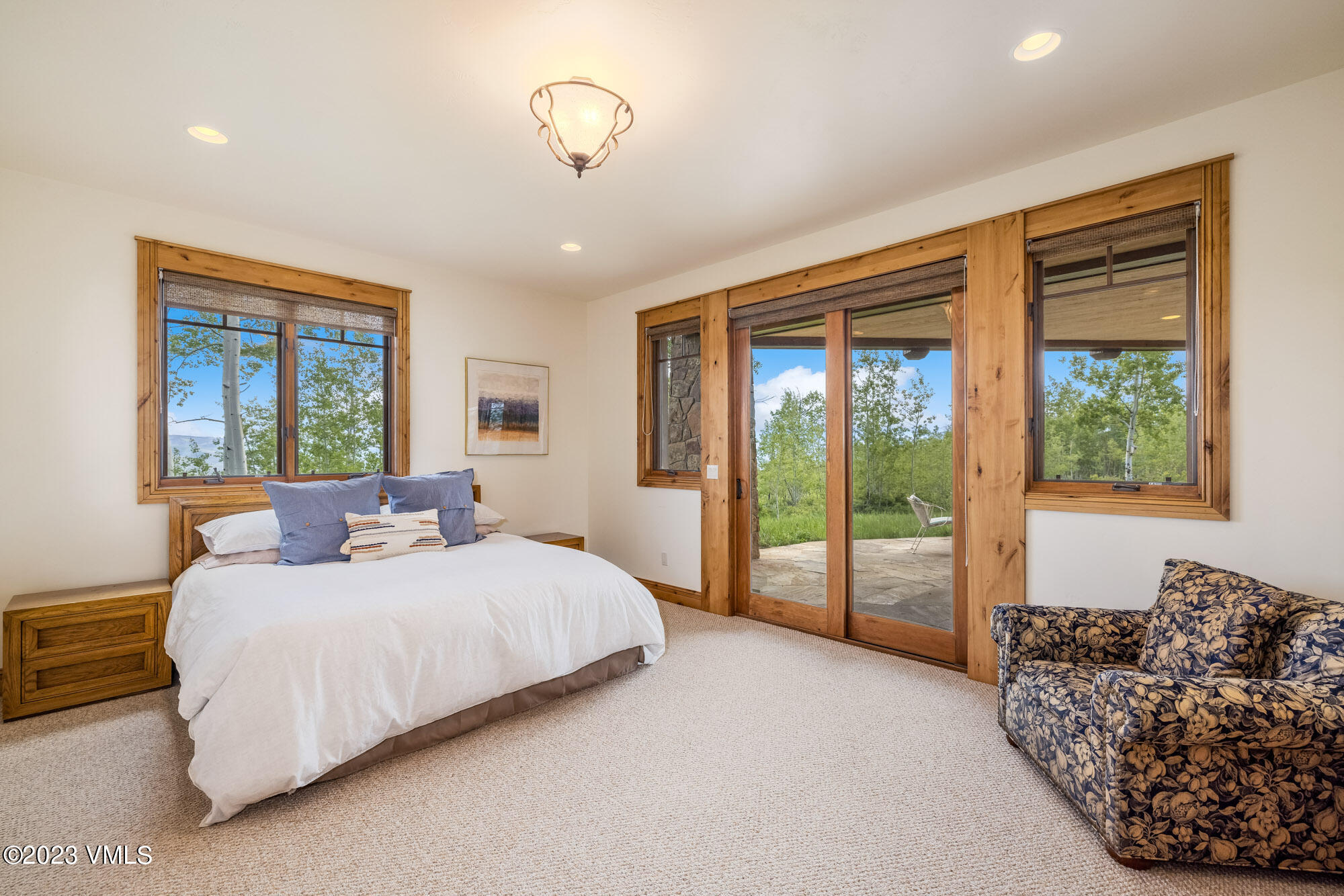 5458 Bellyache Ridge Road Wolcott, CO 81655 - Photo 23 of 63 a bedroom with a bed and a large window