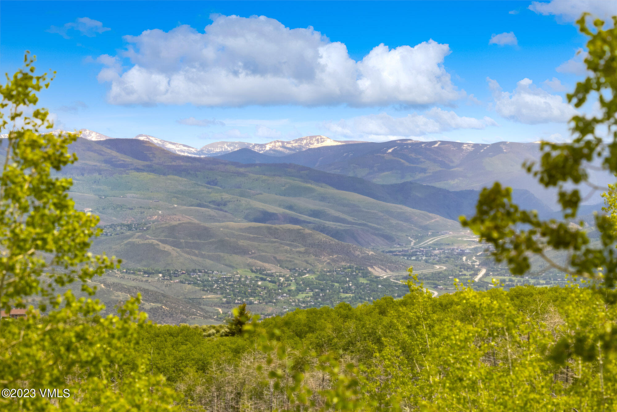 5458 Bellyache Ridge Road Wolcott, CO 81655 - Photo 56 of 63 a view of a lake with mountains in the background