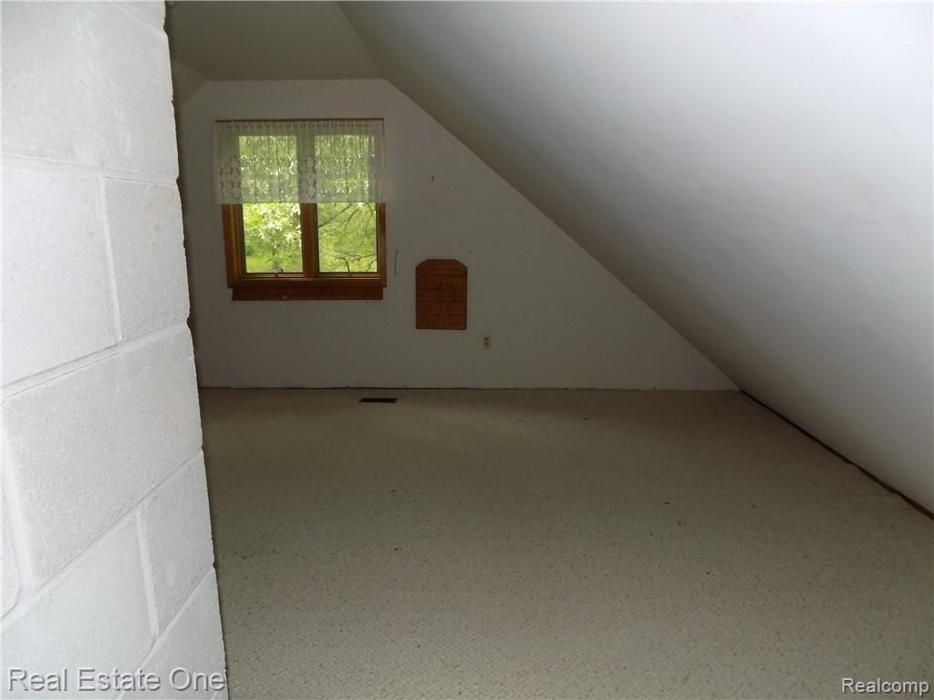 4650 Clyde Road Holly, MI 48442 - Photo 50 of 68 looking into the bonus room from the doorway