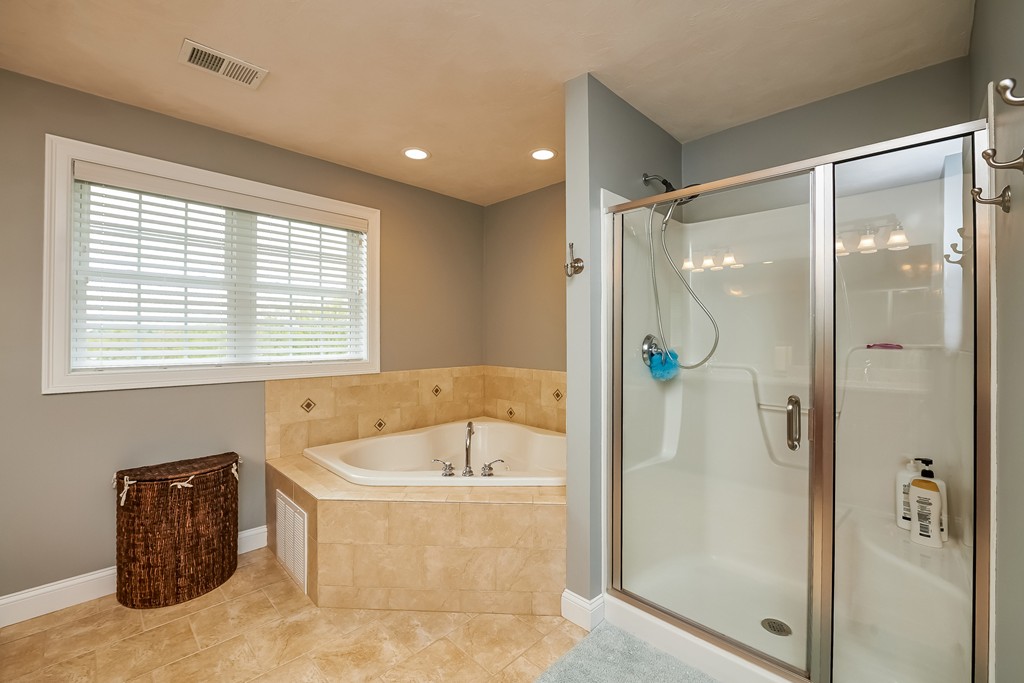13 West Ledge Road Clinton, MA 01510 - Photo 19 of 30 a bathroom with a bathtub and a shower