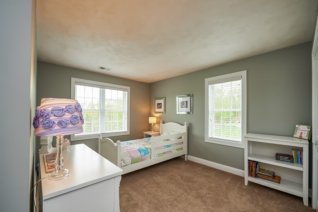 13 West Ledge Road Clinton, MA 01510 - Photo 20 of 30 a bedroom with a bed and a window