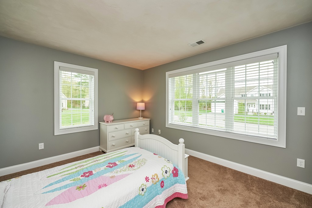 13 West Ledge Road Clinton, MA 01510 - Photo 22 of 30 a bedroom with a bed and a window