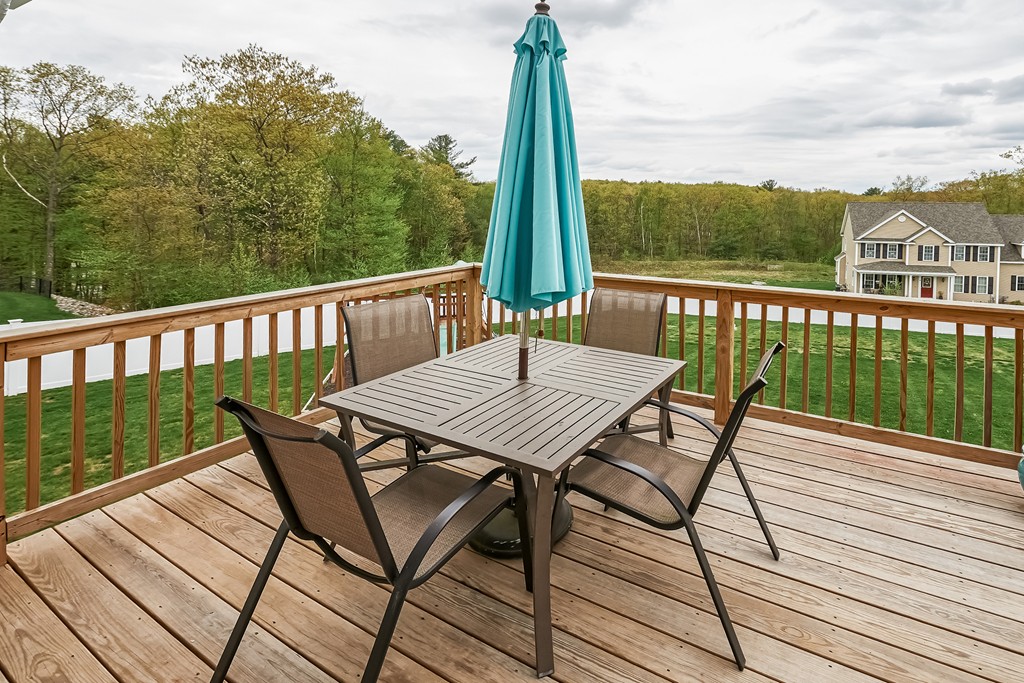 13 West Ledge Road Clinton, MA 01510 - Photo 24 of 30 a view of a chairs on wooden deck