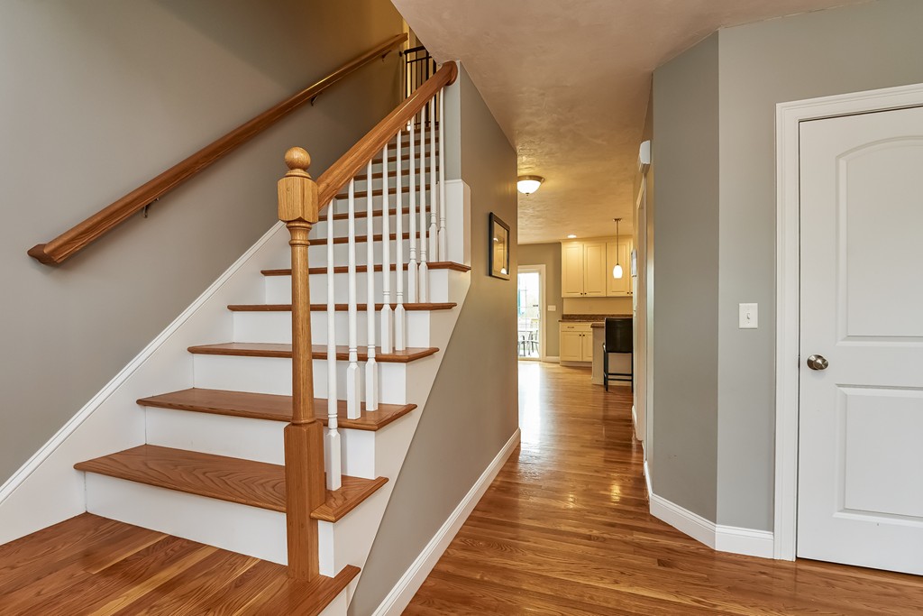 13 West Ledge Road Clinton, MA 01510 - Photo 5 of 30 a view of entryway and hall with wooden floor