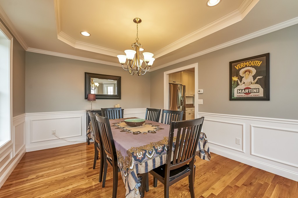 13 West Ledge Road Clinton, MA 01510 - Photo 7 of 30 a view of a dining room with furniture wooden floor and chandelier