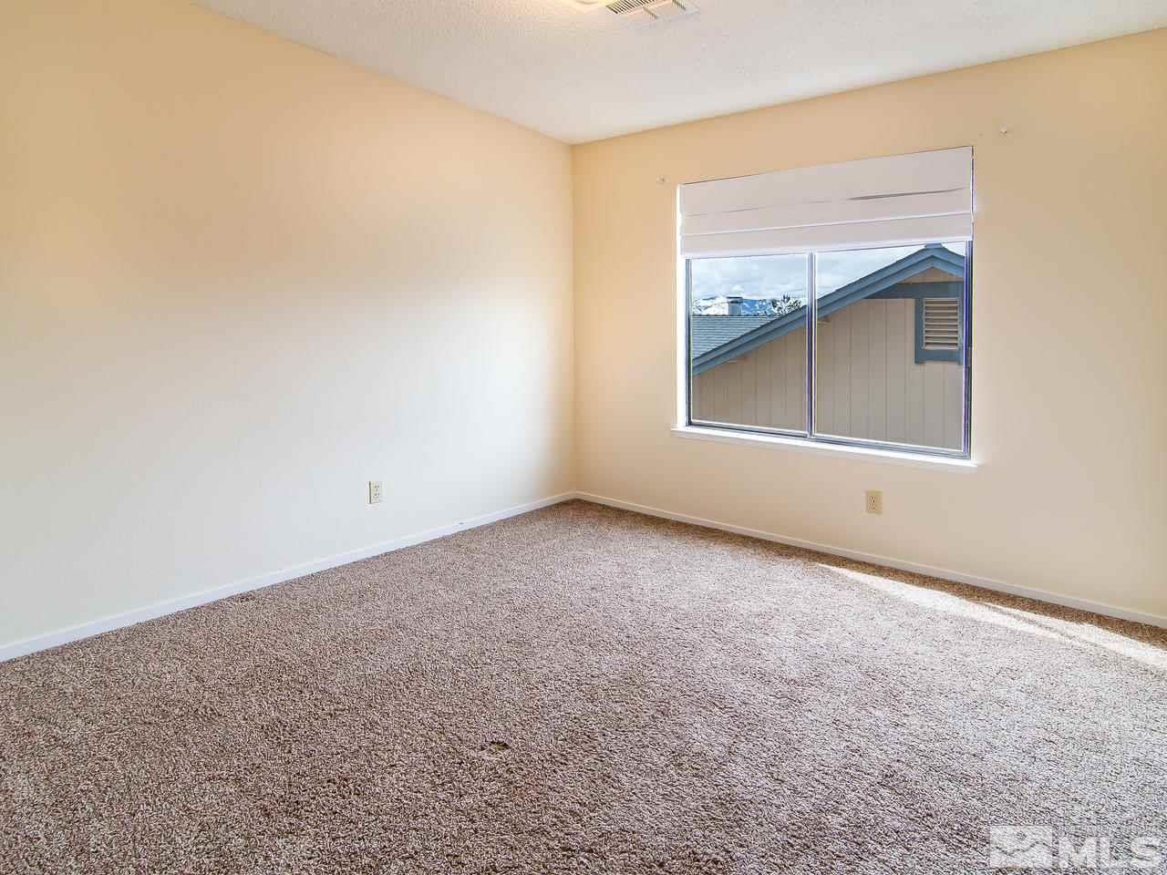 5302 Vista Ridge Way Reno, NV 89523 - Photo 15 of 20 an empty room with a window