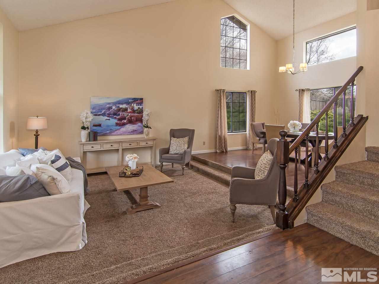5302 Vista Ridge Way Reno, NV 89523 - Photo 3 of 20 a living room with furniture and a wooden floor