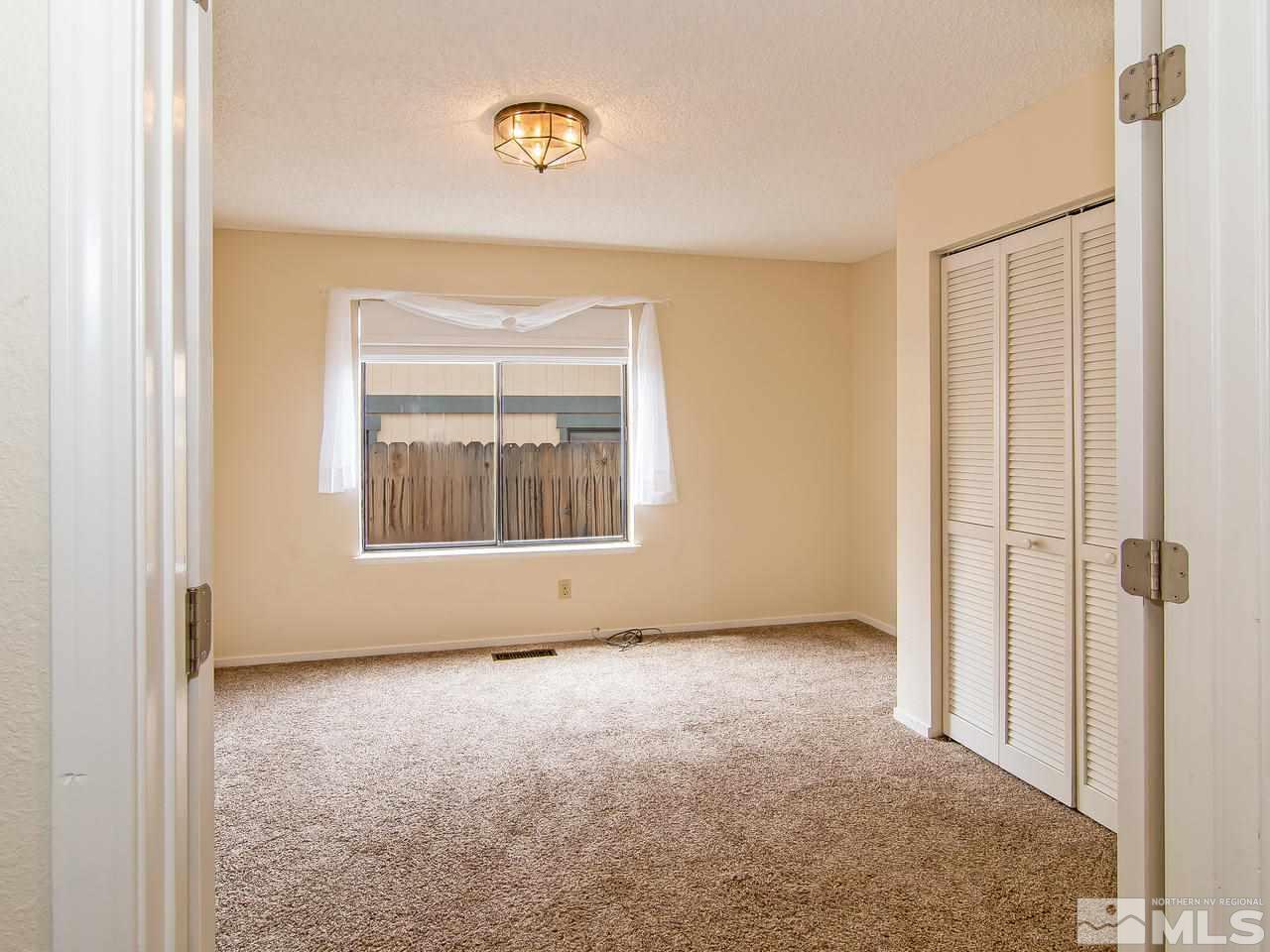 5302 Vista Ridge Way Reno, NV 89523 - Photo 10 of 20 a view of an empty room with a window