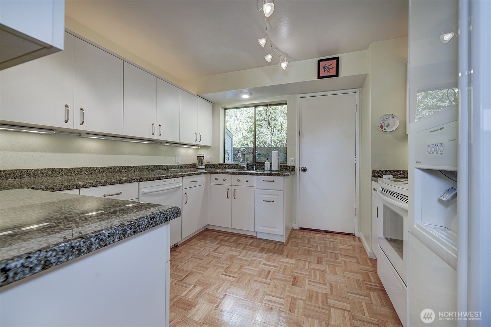 3142 Sahali Drive Bremerton, WA 98310 - Photo 7 of 23 a kitchen with a sink stove and refrigerator