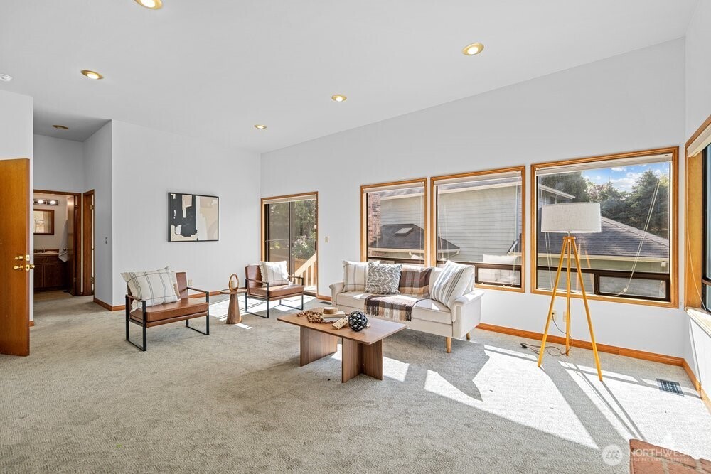902 7th Avenue South Edmonds, WA 98020 - Photo 25 of 31 a living room with furniture and floor to ceiling window