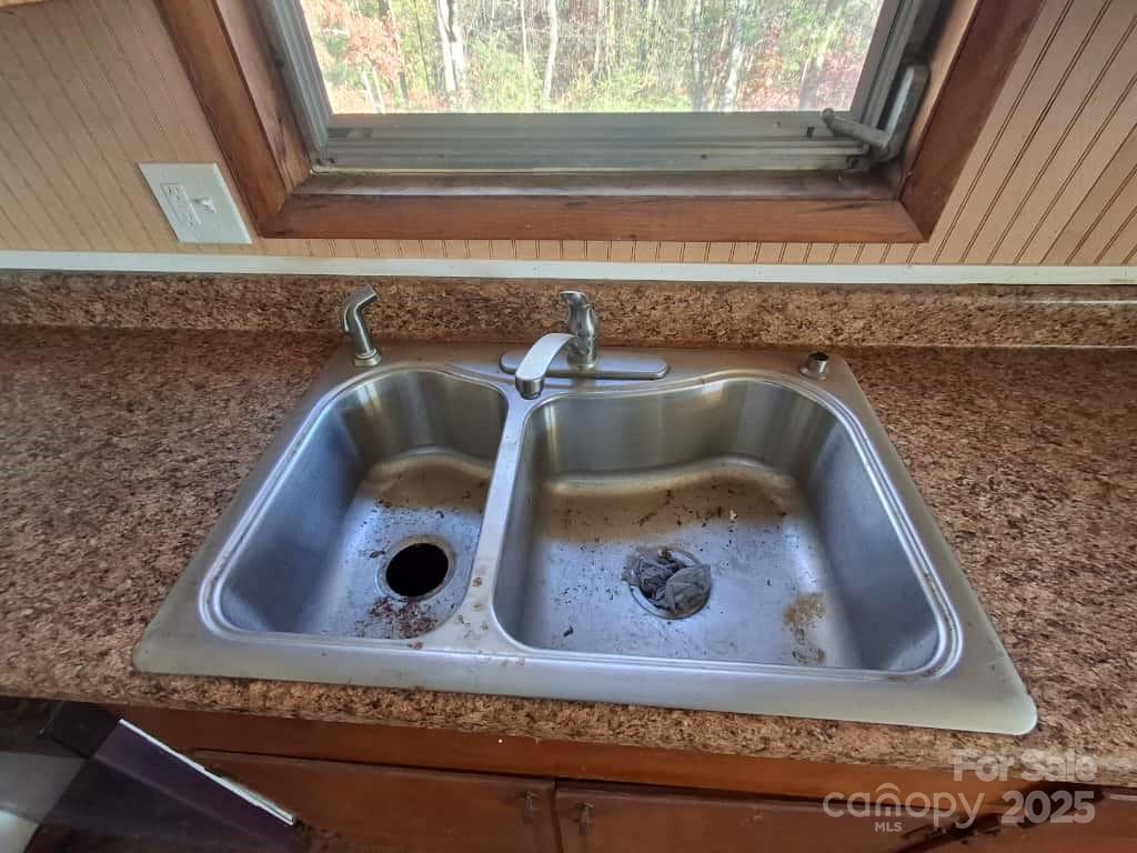 8092 Riverview Road Norwood, NC 28128 - Photo 18 of 45 a bathroom with a sink and a mirror