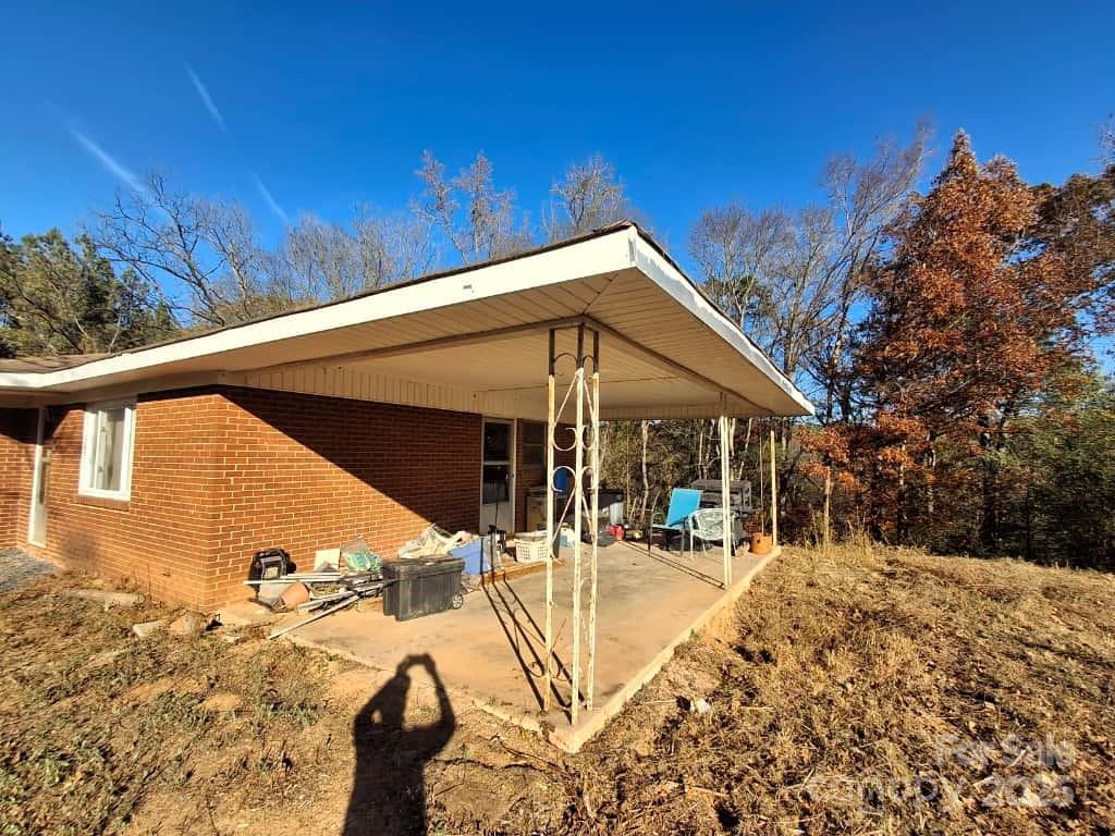 8092 Riverview Road Norwood, NC 28128 - Photo 2 of 45 a view of swimming pool with a patio