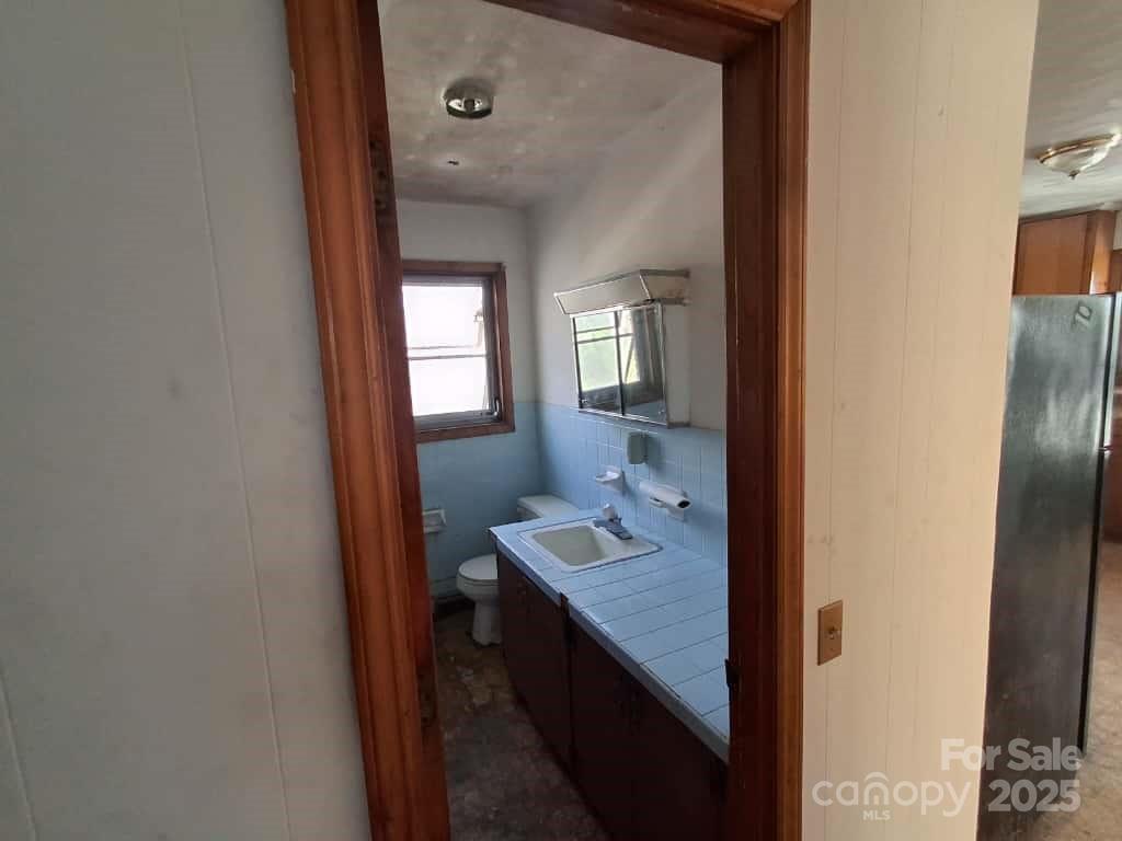8092 Riverview Road Norwood, NC 28128 - Photo 26 of 45 view of a bathroom from a hallway
