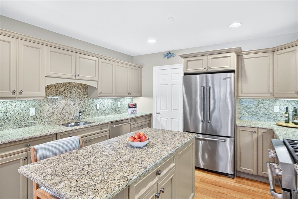 199 East Bay Road, Unit 13 Barnstable, MA 02655 - Photo 15 of 40 a kitchen with refrigerator and window