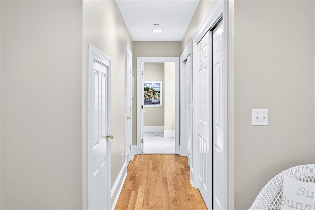 199 East Bay Road, Unit 13 Barnstable, MA 02655 - Photo 20 of 40 a view of hallway with wooden floor
