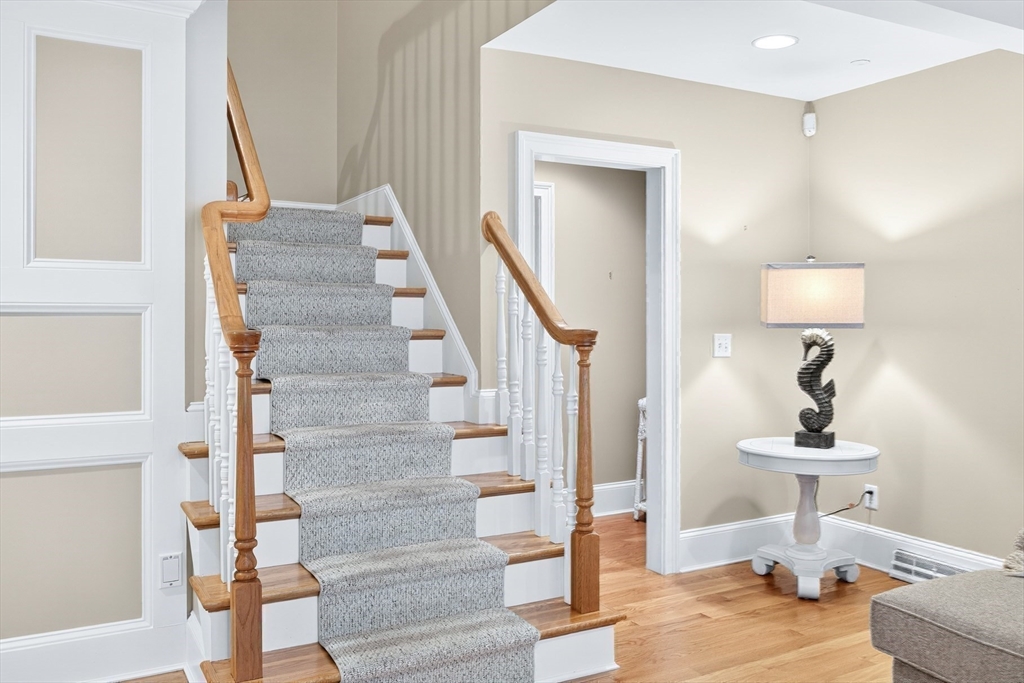 199 East Bay Road, Unit 13 Barnstable, MA 02655 - Photo 22 of 40 a view of entryway and hall with wooden floor