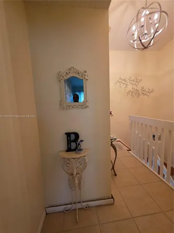 a room with water heater on the wall