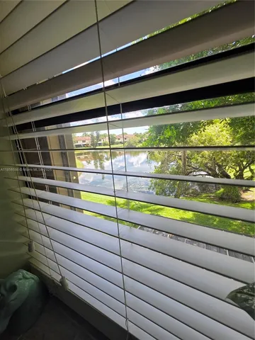 a bathroom with a sink a mirror and a toilet