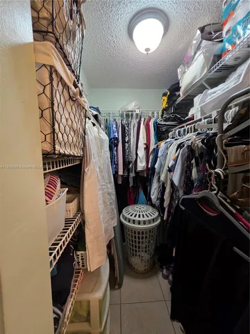 a outdoor space with patio furniture and potted plants