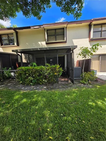 a view of lake with green space