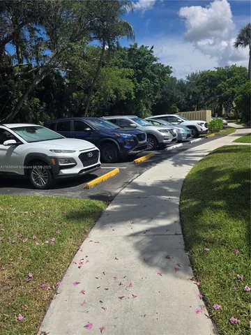 a sign on the side of the park