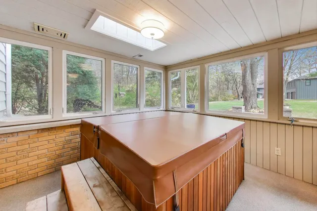 a view of kitchen with sink and natural light