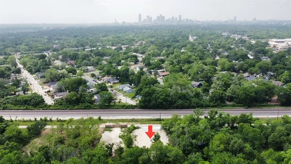 an aerial view of house with yard