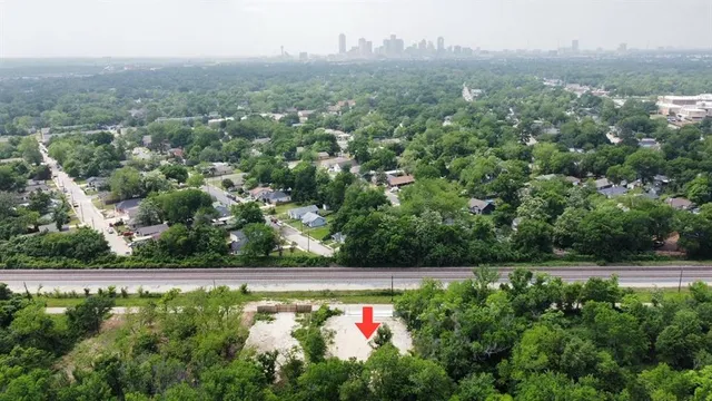 an aerial view of house with yard