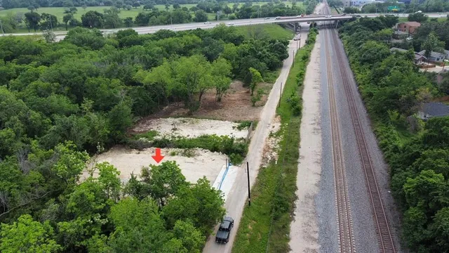 a view of a pathway with a park